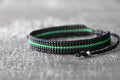 Black Bracelet with Green Line Design