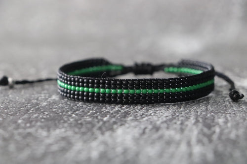 Black Bracelet with Green Line Design