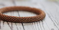 Copper-colored handmade bracelet