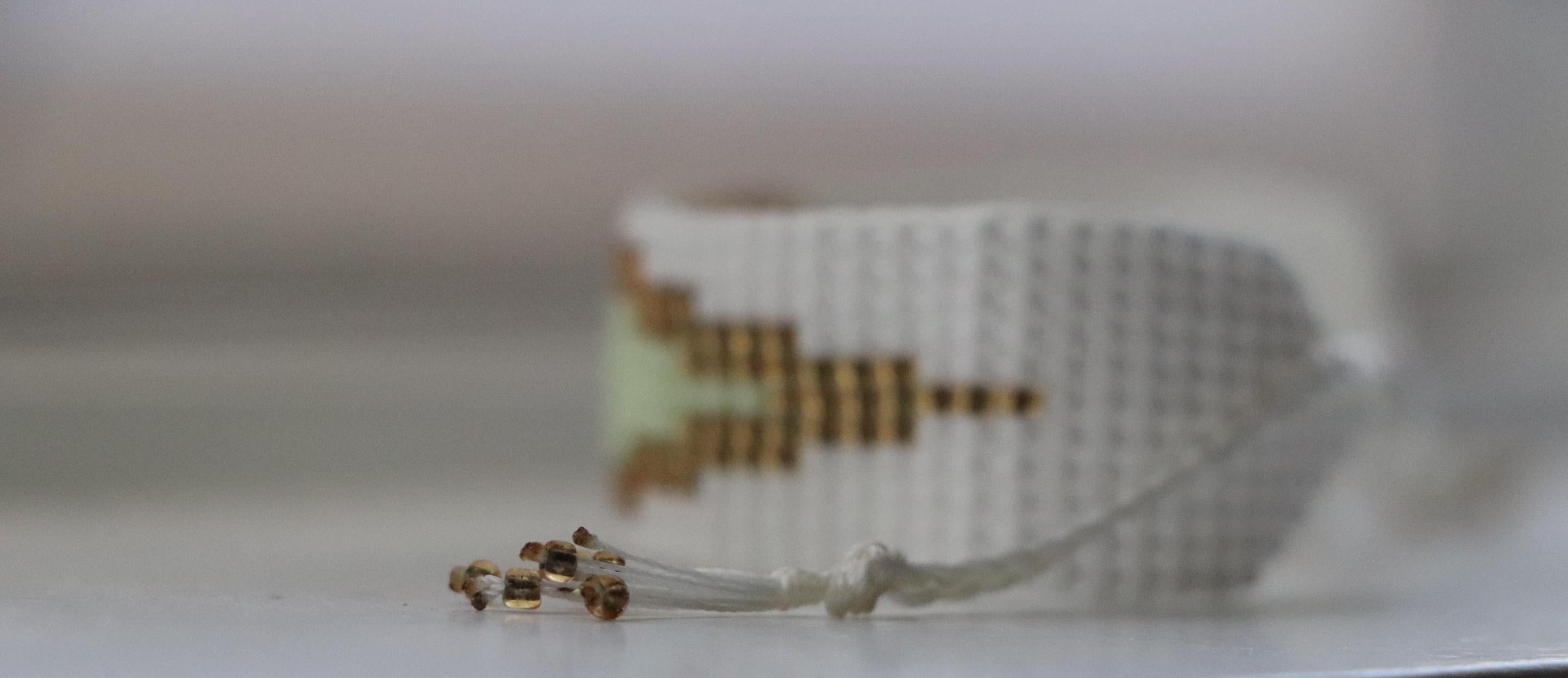 Gold and White Beaded Pattern Bracelet