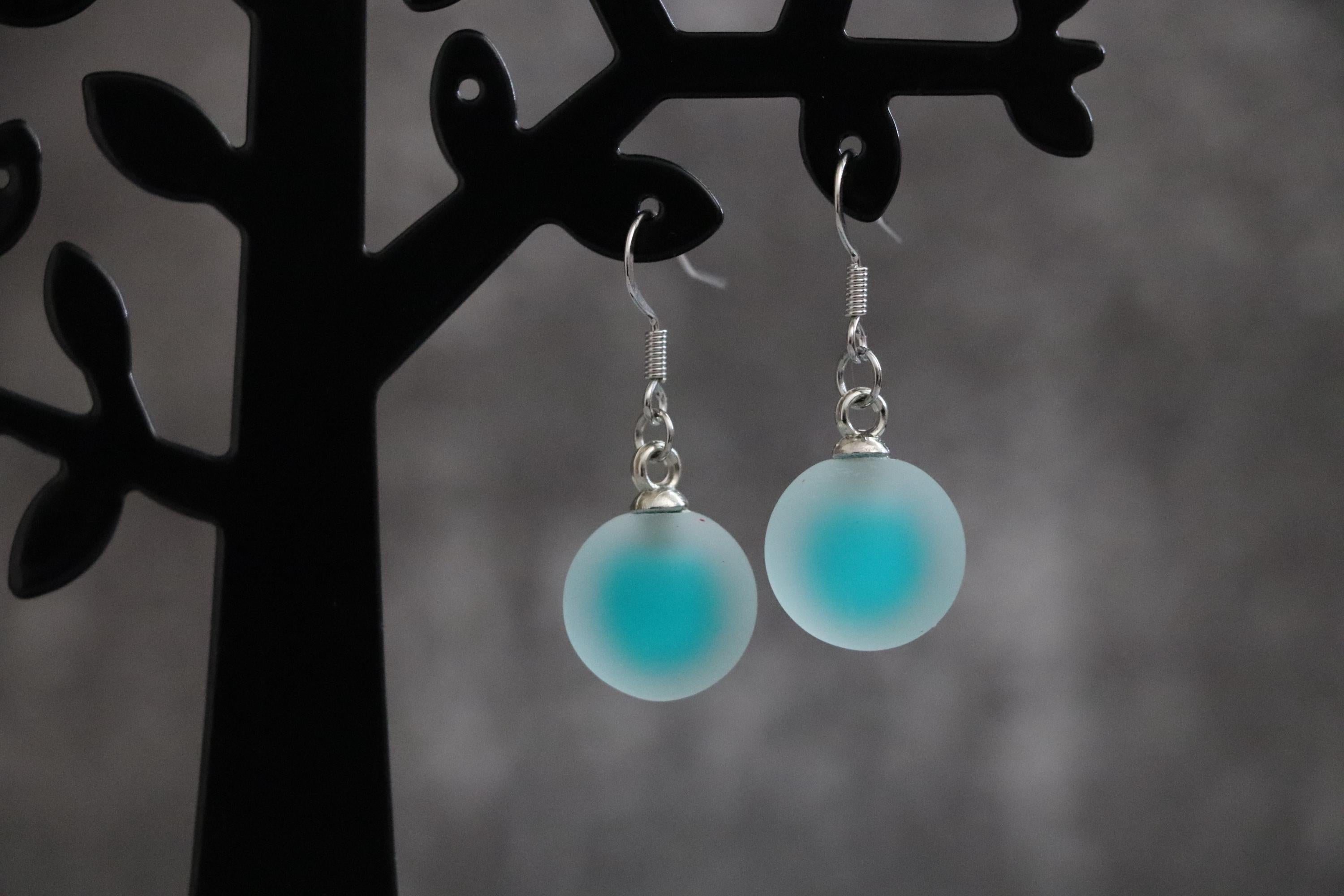 Green Dangle Ball Earrings