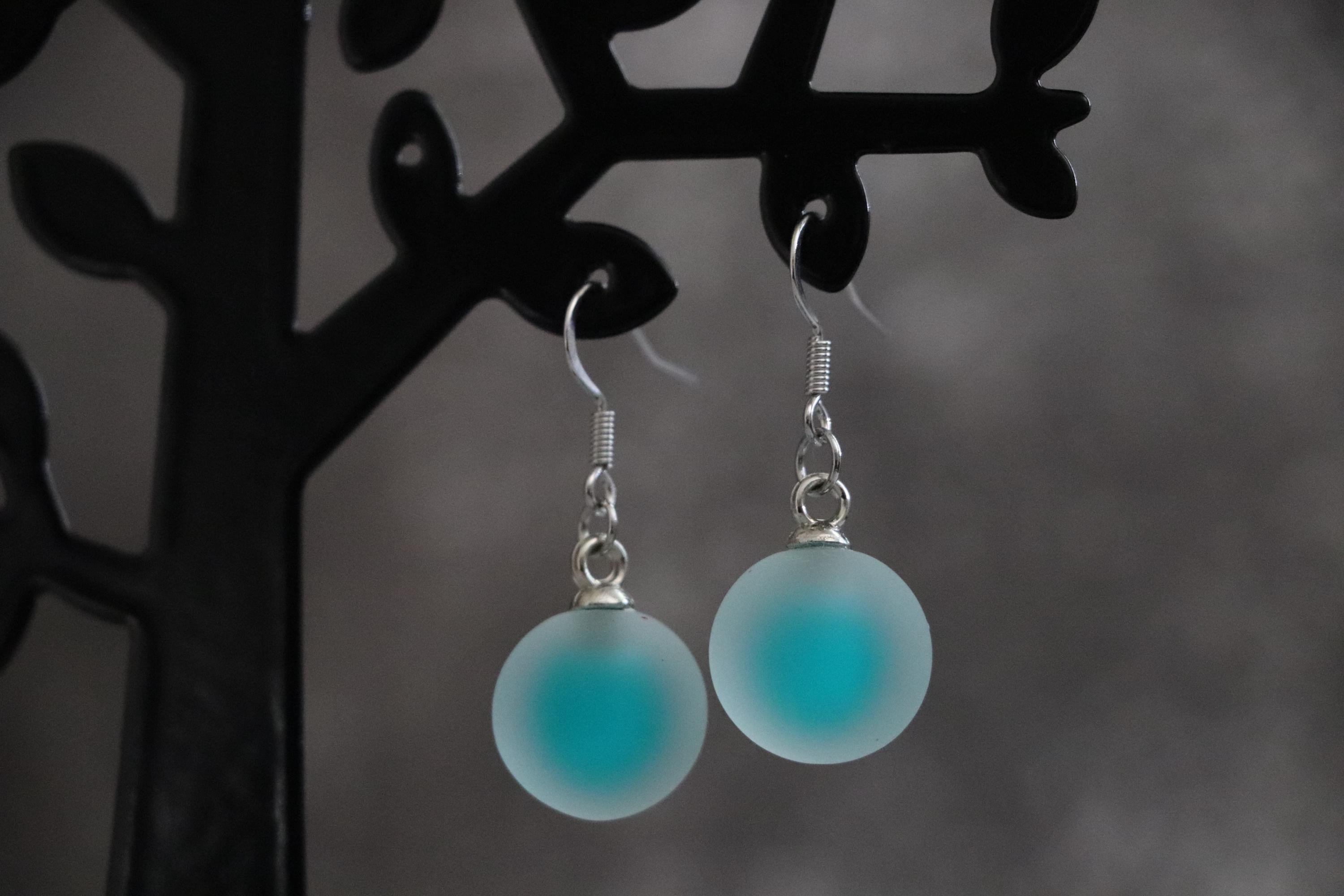 Green Dangle Ball Earrings