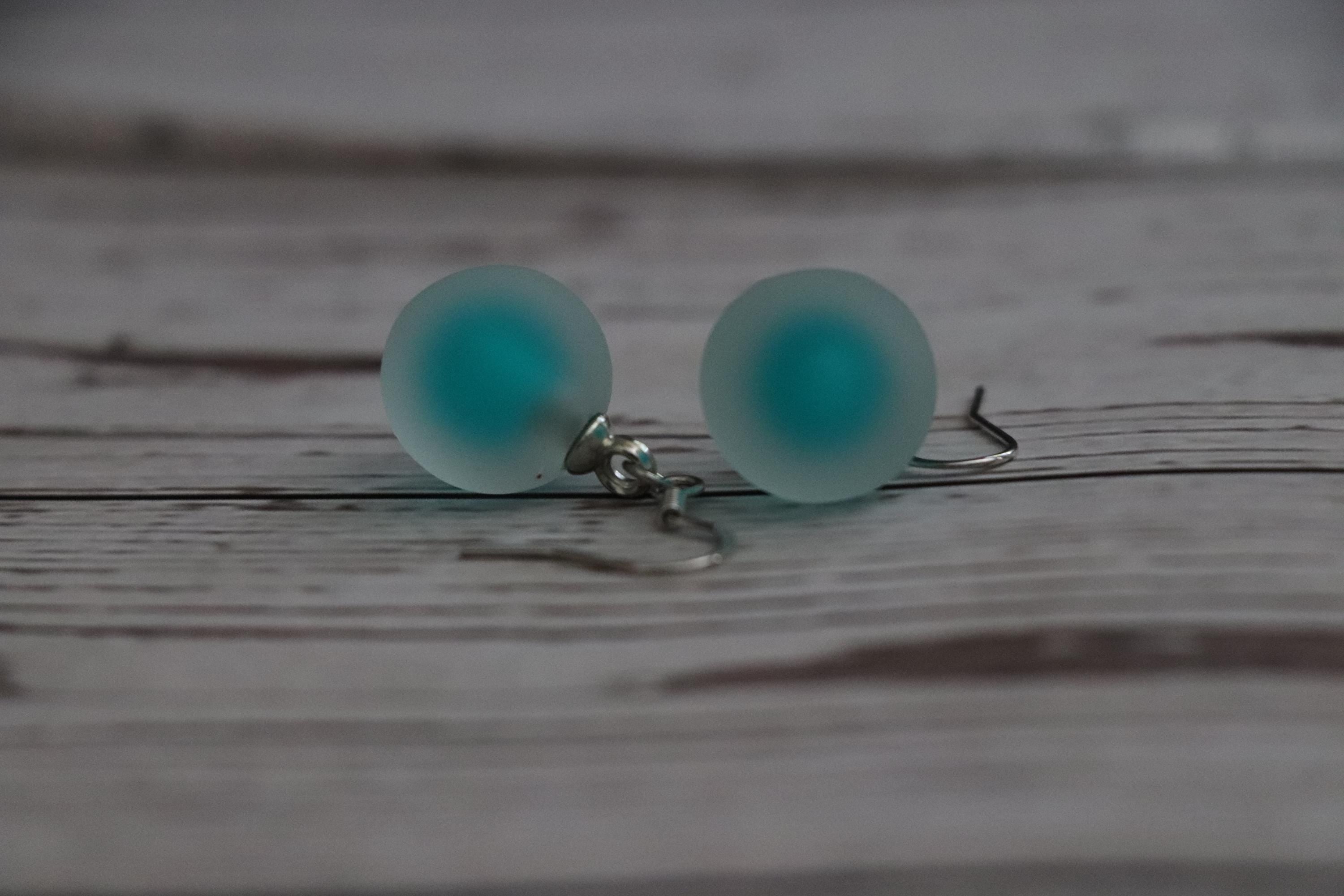Green Dangle Ball Earrings