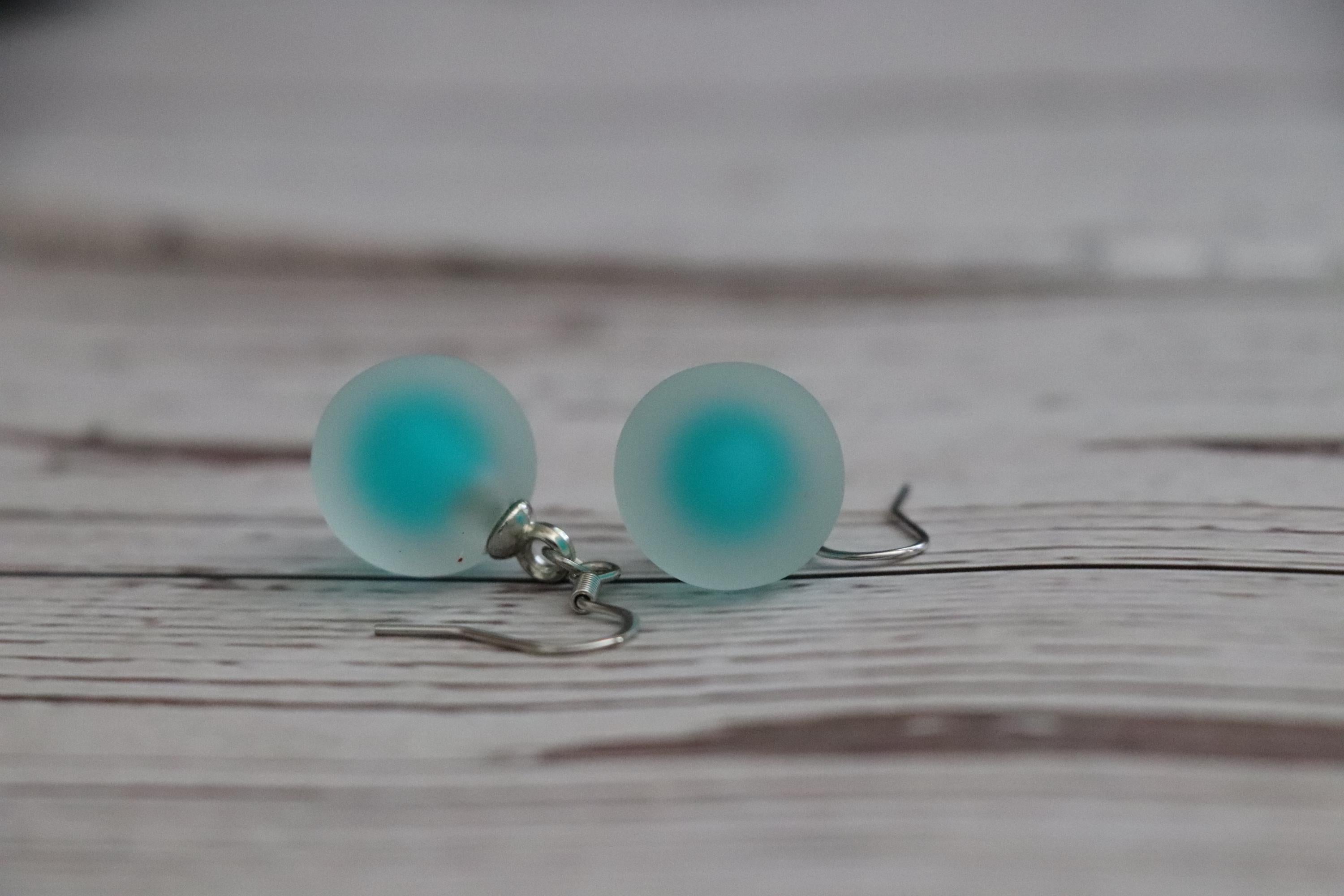 Green Dangle Ball Earrings