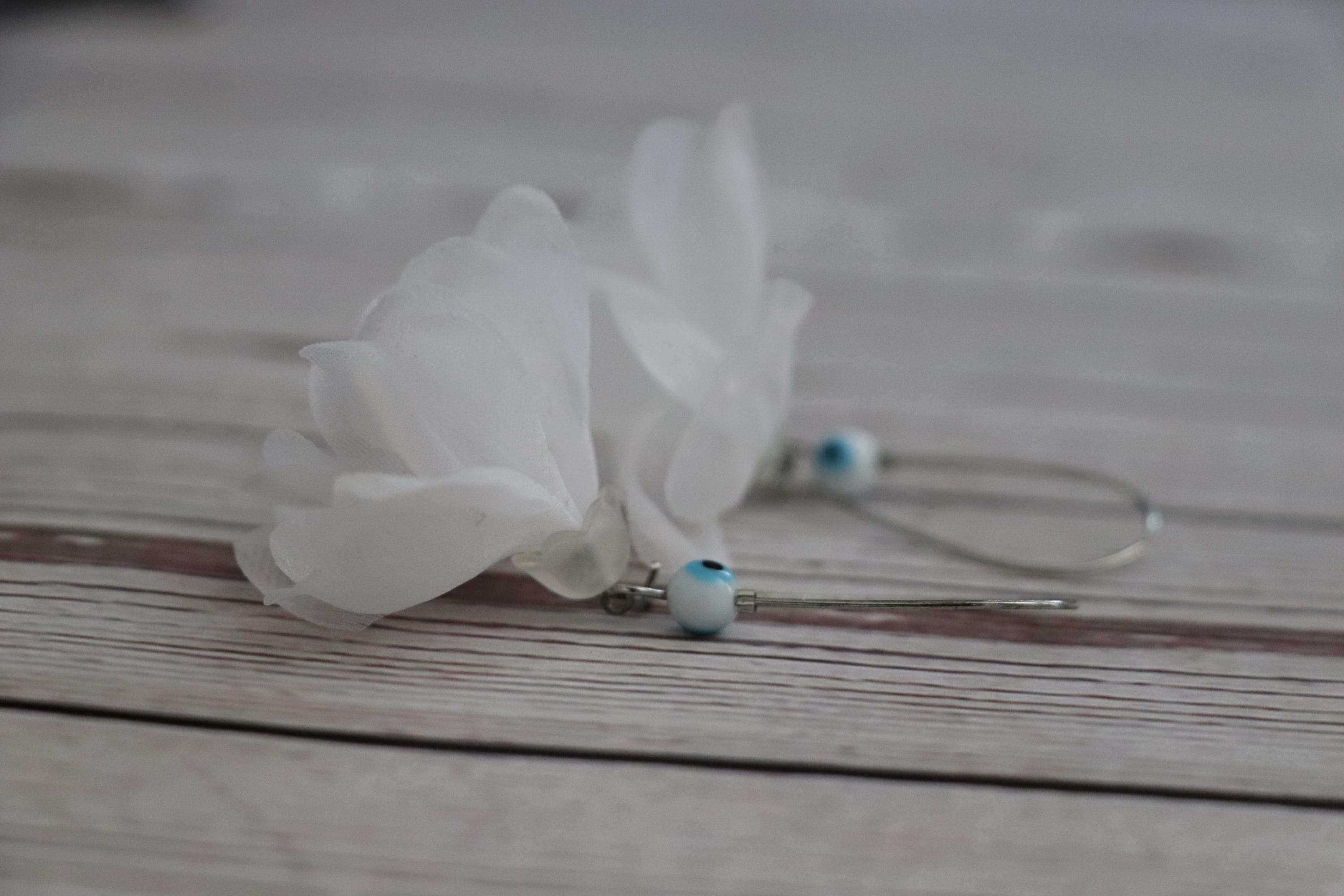 Handmade White Flower Earrings with Evil Eye